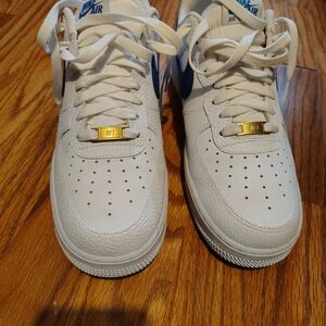 Nike Air Force 1 White with Blue Swoosh and Gold Details